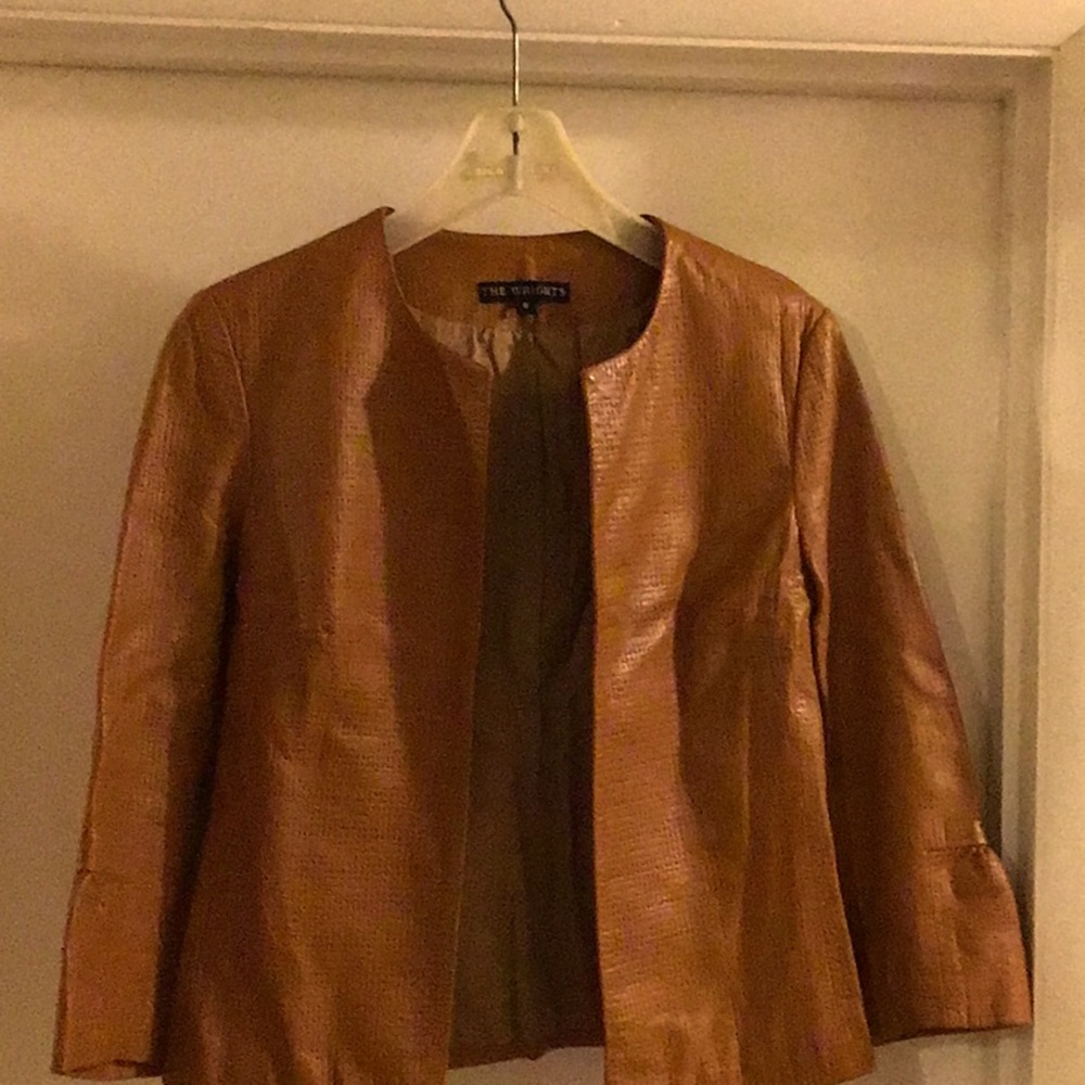 Camel colored printed leather.